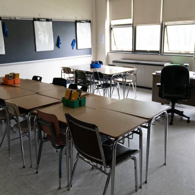 FILE - Desks fill a classroom in a high school in Pennsylvania on Wednesday, May 3, 2023. (AP Photo/Matt Rourke, File)
