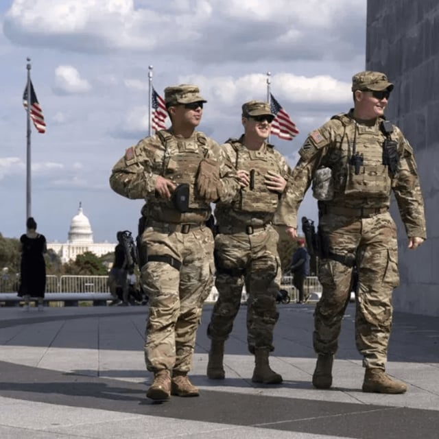Tennessee Governor Bill Lee and Senator London Lamar are pictured alongside members of the Louisiana National Guard. (Photos: AP Photo/Jose Luis Magana)