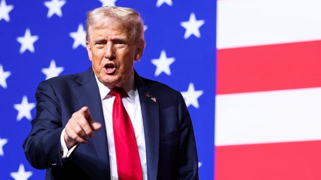 U.S. President Donald Trump gestures after speaking during a meeting of senior military leaders convened by U.S. Defense Secretary Pete Hegseth, at Marine Corps Base Quantico in Quantico, Virginia, U.S., September 30, 2025. REUTERS/Kevin Lamarque