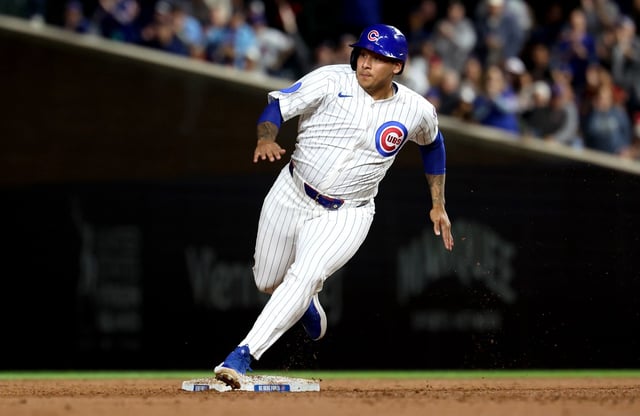 Cubs' Moisés Ballesteros rounds second base to advance to third on a run-scoring double by Seiya Suzuki in the third inning against the Mets at Wrigley Field on Sept. 24, 2025. (Chris Sweda/Chicago Tribune)