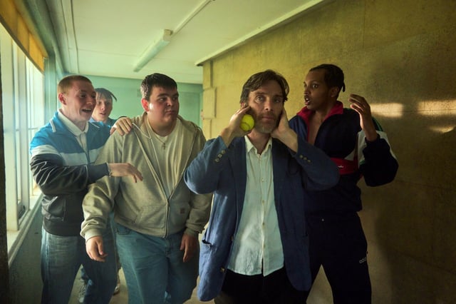 Cillian Murphy, third from left, tries to reach troubled young men at a reform school in England in “Steve.” (Courtesy of Netflix