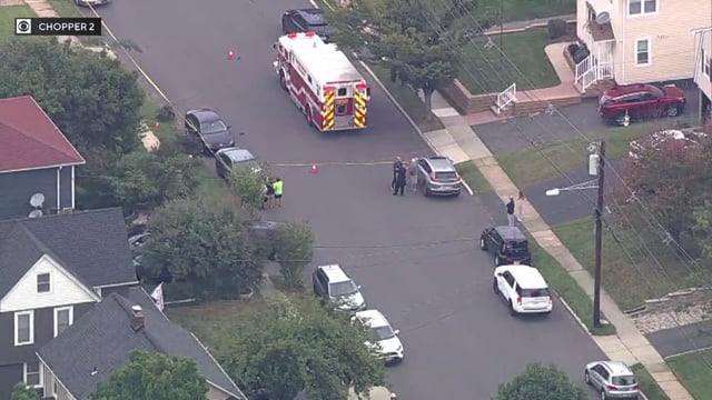 Cops said a man driving a black SUV through Cranford struck the two girls on a residential street, then fled the scene. Police later tracked down the driver, who has not been publicly identified, and took him into custody. (CBS New York)