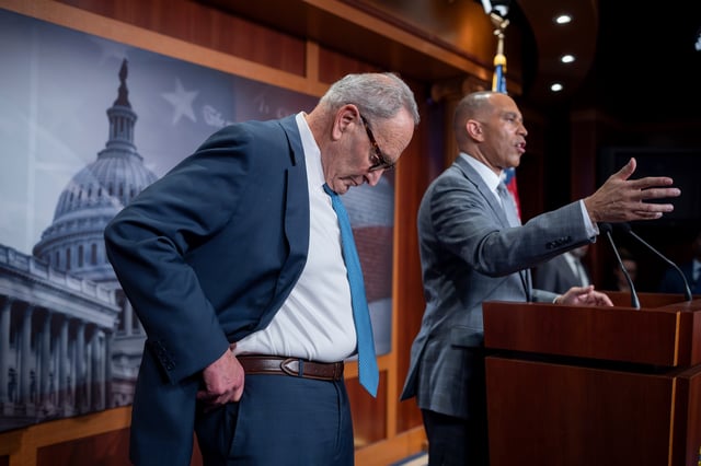 Senate Minority Leader Chuck Schumer, D-N.Y., and House Minority Leader Hakeem Jeffries, D-N.Y., right, talk with reporters following their meeting with President Donald Trump and Republican leaders on the government funding crisis, at the Capitol in Washington, Monday, Sept. 29, 2025. (AP Photo/J. Scott Applewhite)
