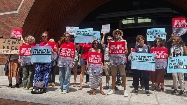 Demonstrators stand outside the federal courthouse after the first day of a trial in a lawsuit filed by the American Association of University Professors and others, which challenges the U.S. President Donald Trump administration's arrest and deportation of pro-Palestinian campus activists, in Boston, Massachusetts, U.S., July 7, 2025. REUTERS/Nate Raymond