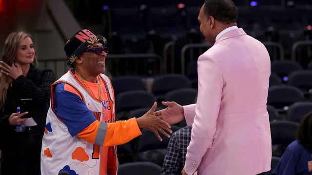 May 16, 2025; New York, New York, USA; American director Spike Lee (left) shakes hands with ESPN personality Stephen A. Smith before game six in the second round of the 2025 NBA Playoffs between the New York Knicks and the Boston Celtics at Madison Square Garden. Mandatory Credit: Brad Penner-Imagn Images