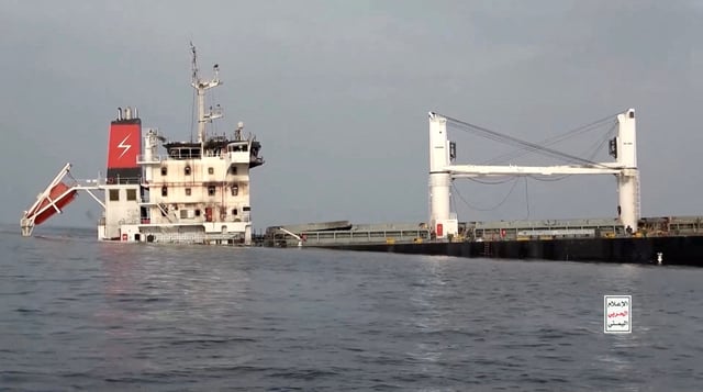 A vessel said to be Greek-operated, Liberia-flagged Eternity C sinks in footage released by Yemen's Houthis, in the Red Sea, in this screen grab taken from a handout video released on July 9, 2025.    HOUTHI MEDIA CENTER/Handout via REUTERS/File Photo