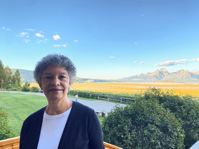 Federal Reserve Bank of Boston President Susan Collins stands behind the Jackson Lake Lodge in Jackson Hole, where the Kansas City Fed holds its annual economic symposium, in Wyoming, U.S., August 24, 2023. REUTERS/Ann Saphir
