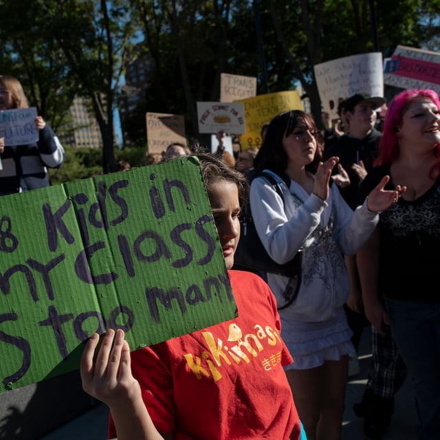 Students walk out of school to join a protest in support of pay for teachers and funding for schools at the Alberta Legislature in Edmonton on Monday, September 22, 2025. THE CANADIAN PRESS/Amber Bracken