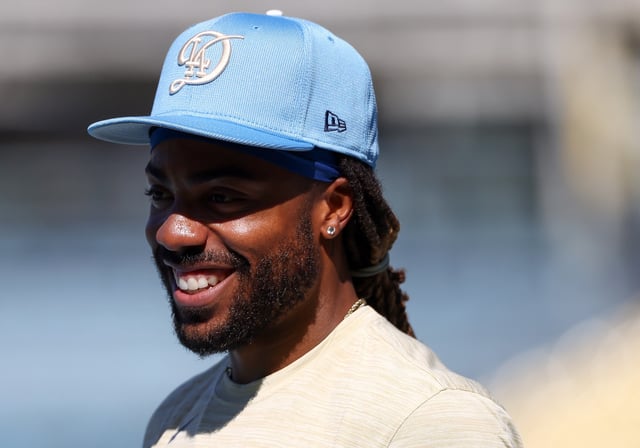 LOS ANGELES, CALIFORNIA - AUGUST 16: Justin Dean #75 of the Los Angeles Dodgers looks on during batting practice prior to the game against the San Diego Padres at Dodger Stadium on August 16, 2025 in Los Angeles, California. (Photo by Katelyn Mulcahy/Getty Images)