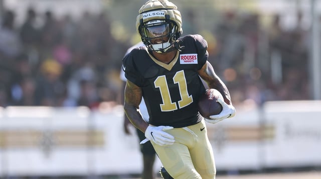 Jul 28, 2025; Metairie, LA, USA; New Orleans Saints wide receiver Cedrick Wilson Jr. (11) on runs routes during training camp at Ochsner Sports Performance Center. Mandatory Credit: Stephen Lew-Imagn Images