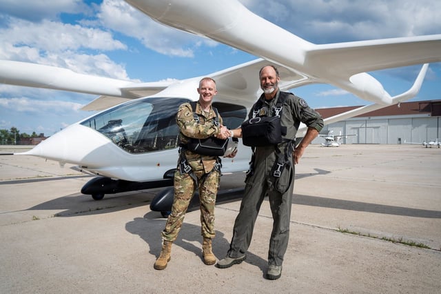 U.S. Army Combat Capabilities Development Command Aviation & Missile Center Experimental Test Pilot Maj. Wes Ogden celebrates making history as the first Army aviator to fly an electric aircraft with Charles 'Camron' Guthrie, of BETA Technologies. Photo: U.S. Army.