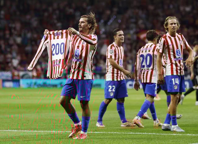 Soccer Football - UEFA Champions League - Atletico Madrid v Eintracht Frankfurt - Riyadh Air Metropolitano, Madrid, Spain - September 30, 2025 Atletico Madrid's Antoine Griezmann celebrates scoring their third goal to reach two hundred goal for Atletico Madrid REUTERS/Susana Vera