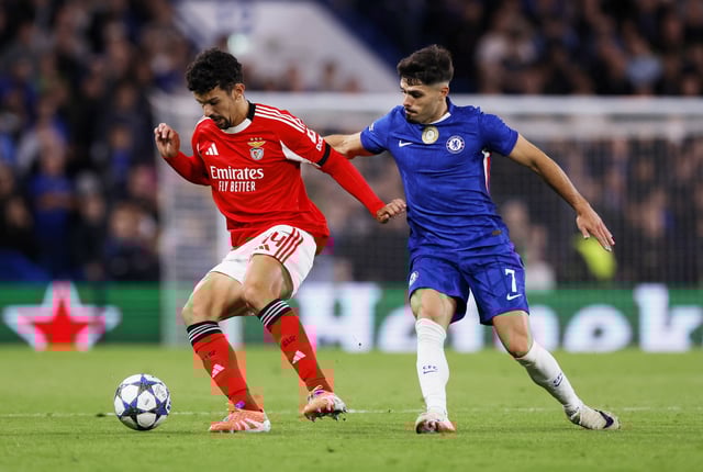 Soccer Football - UEFA Champions League - Chelsea v Benfica - Stamford Bridge, London, Britain - September 30, 2025 Benfica's Tomas Araujo in action with Chelsea's Pedro Neto Action Images via Reuters/Andrew Couldridge