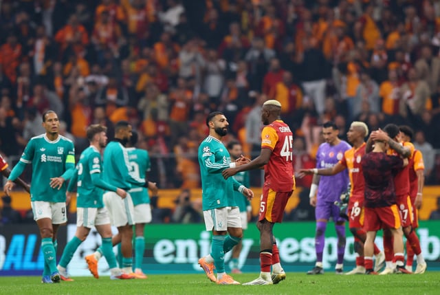 Soccer Football - UEFA Champions League - Galatasaray v Liverpool - Rams Park, Istanbul, Turkey - September 30, 2025  Galatasaray's Victor Osimhen and Liverpool's Mohamed Salah shake hands after the match REUTERS/Murad Sezer