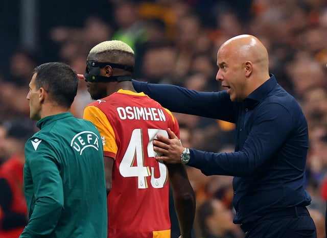 Soccer Football - UEFA Champions League - Galatasaray v Liverpool - Rams Park, Istanbul, Turkey - September 30, 2025 Galatasaray's Victor Osimhen and Liverpool manager Arne Slot REUTERS/Murad Sezer