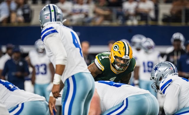 Green Bay Packers linebacker Micah Parsons (1) looks towards Dallas Cowboys quarterback Dak Prescott (4) during a game, Sunday, Sept. 28, 2025, Arlington, Texas.
