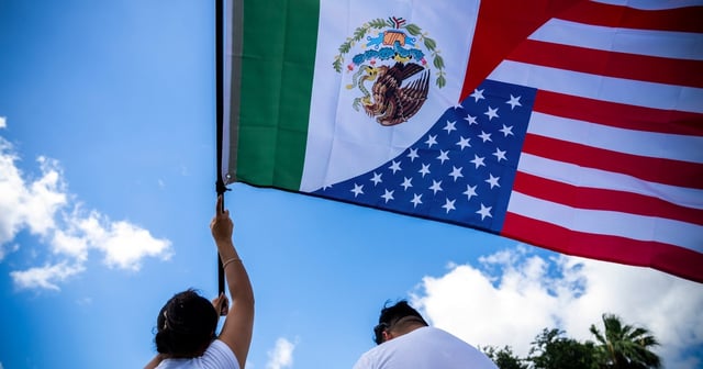 Protesters demonstrate at a No Kings rally in McAllen on June 14, 2025.