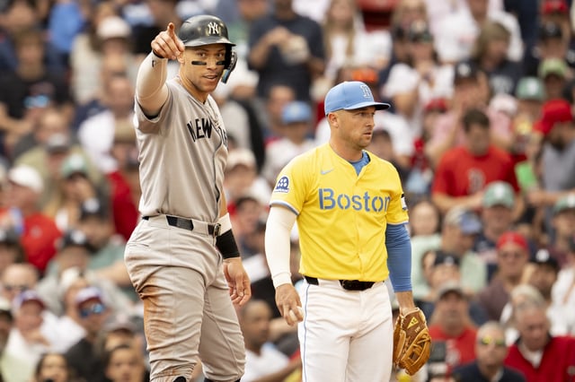 Aaron Judge #99 of the New York Yankees reacts during the third inning of a game against the Boston Red Sox on September 13, 2025 at Fenway Park in Boston, Massachusetts.