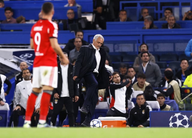 Soccer Football - UEFA Champions League - Chelsea v Benfica - Stamford Bridge, London, Britain - September 30, 2025 Benfica coach Jose Mourinho kicks a match ball away Action Images via Reuters/Andrew Couldridge