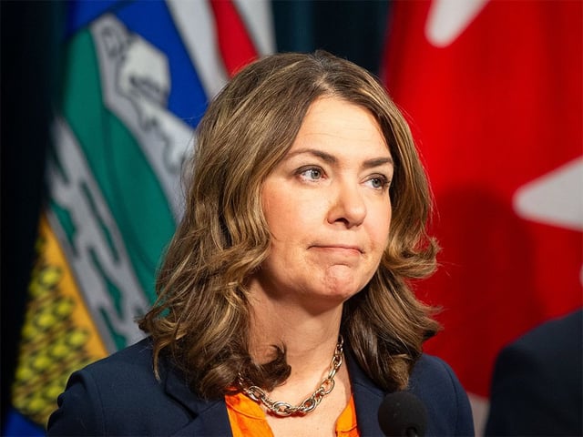  Premier Danielle Smith speaks to media in Calgary on Tuesday, Sept. 30, 2025 regarding a looming teacher’s strike.