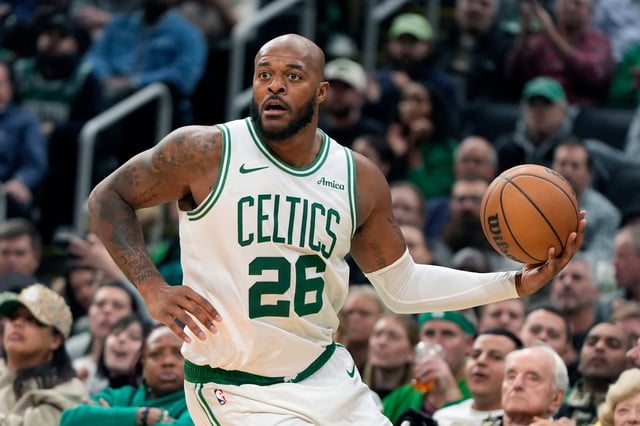 Boston Celtics' Xavier Tillman plays against the Milwaukee Bucks during the second half of an NBA basketball game, Monday, Oct. 28, 2024, in Boston. (AP Photo/Michael Dwyer)