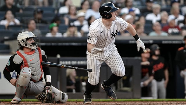 Sep 28, 2025; Bronx, New York, USA; New York Yankees first baseman Ben Rice (22) hits a solo home run against the Baltimore Orioles during the eighth inning at Yankee Stadium. Mandatory Credit: John Jones-Imagn Images