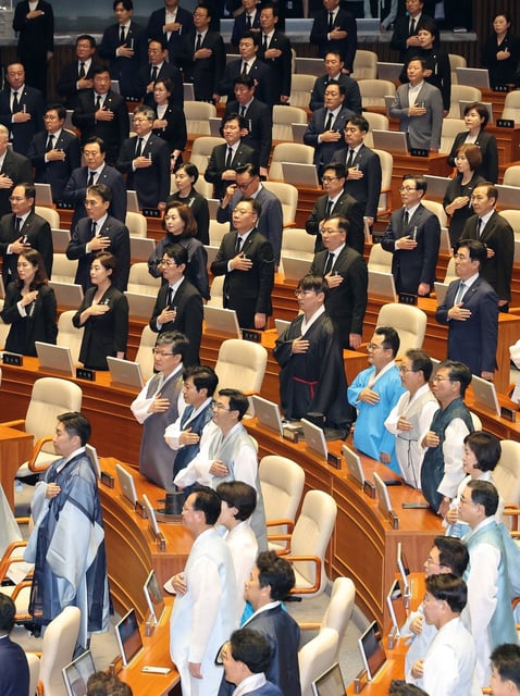 Lawmakers take part in a plenary session at the National Assembly in Seoul on September 1. Some opposition lawmakers have raised security and safety issues over South Korea’s visa-free scheme for Chinese tour groups. Photo: EPA/Yonhap