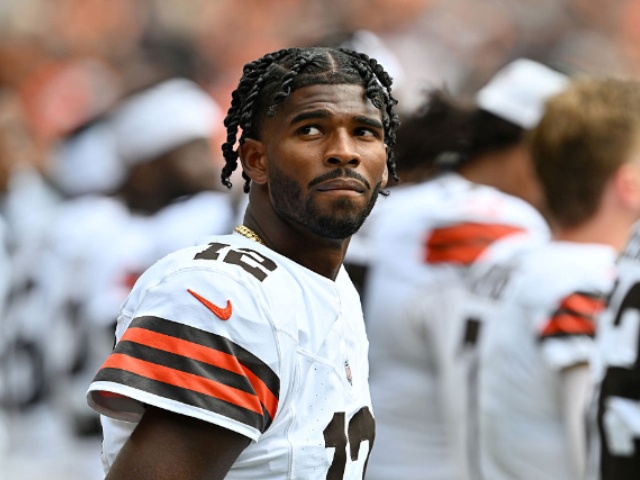 CLEVELAND, OHIO - AUGUST 23: Quarterback Shedeur Sanders #12 of the Cleveland Browns listens to the national anthem before an NFL Preseason 2025 game against the Los Angeles Rams at Huntington Bank Field on August 23, 2025 in Cleveland, Ohio. (Photo by Jason Miller/Getty Images)
