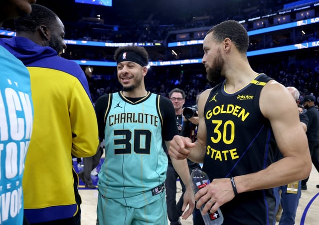 Charlotte Hornets’ Seth Curry (30) talks with Golden State Warriors’ Draymond Green (23) and Golden State Warriors’ Stephen Curry (30) after the Warriors 128-92 win at Chase Center in San Francisco, Calif., on Tuesday, Feb. 25, 2025. (Ray Chavez/Bay Area News Group)