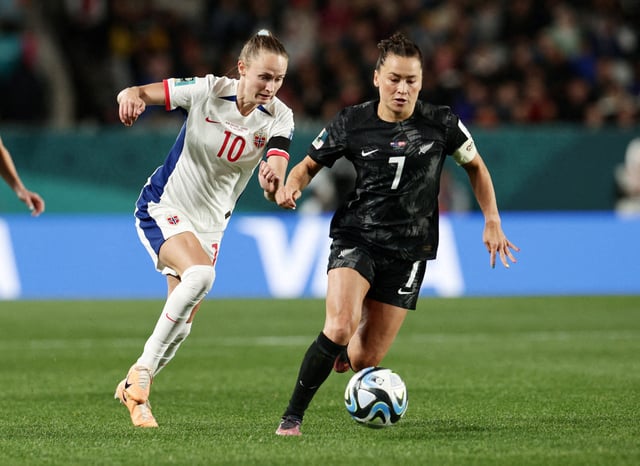 Soccer Football - FIFA Women’s World Cup Australia and New Zealand 2023 - Group A - New Zealand v Norway - Eden Park, Auckland, New Zealand - July 20, 2023 New Zealand's Ali Riley in action with Norway's Caroline Graham Hansen REUTERS/David Rowland