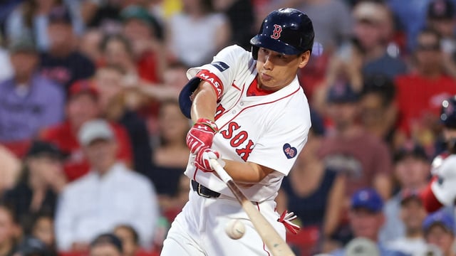 Aug 28, 2024; Boston, Massachusetts, USA; Boston Red Sox designated hitter Masataka Yoshida (7) hits a single during the first inning against the Kansas City Royals at Fenway Park. Mandatory Credit: Paul Rutherford-Imagn Images