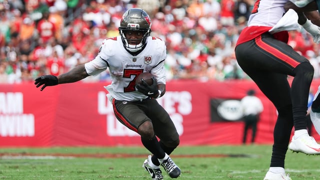 Sep 28, 2025; Tampa, Florida, USA; Tampa Bay Buccaneers running back Bucky Irving (7) runs the ball during the first quarter against the Philadelphia Eagles at Raymond James Stadium. Mandatory Credit: Nathan Ray Seebeck-Imagn Images