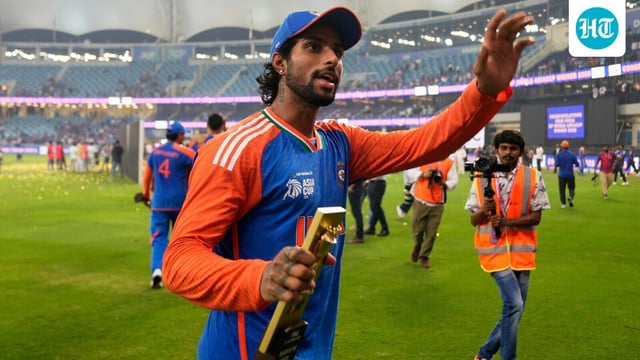 India's Tilak Varma greets fans after India won the Asia Cup cricket final against Pakistan at Dubai International Cricket Stadium, United Arab Emirates, Sunday, Sept. 28, 2025. (AP Photo/Altaf Qadri)
