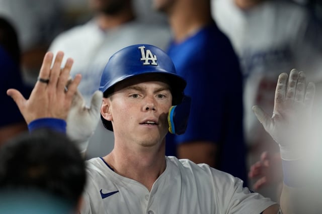 With With Smith, pictured, still somewhat limited by a hairline fracture in his right wrist, the Dodgers are carrying three catchers for the Wild Card Series – Smith, Dalton Rushing and Ben Rortvedt – so Smith could be used as a pinch-hitter with Rortvedt and Rushing handling most of the defensive work. (AP Photo/Ashley Landis)