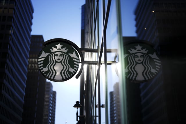 Signage at a Starbucks coffee shop is shown in this file photo. At least 12 locations in B.C. have closed recently.
