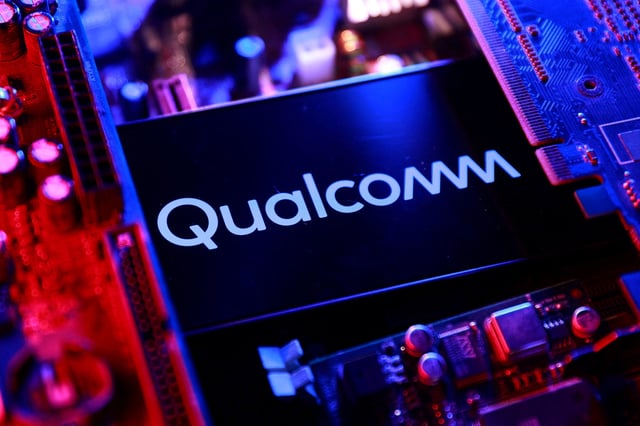 A Qualcomm logo and a computer motherboard appear in this illustration taken August 25, 2025. REUTERS/Dado Ruvic/Illustration