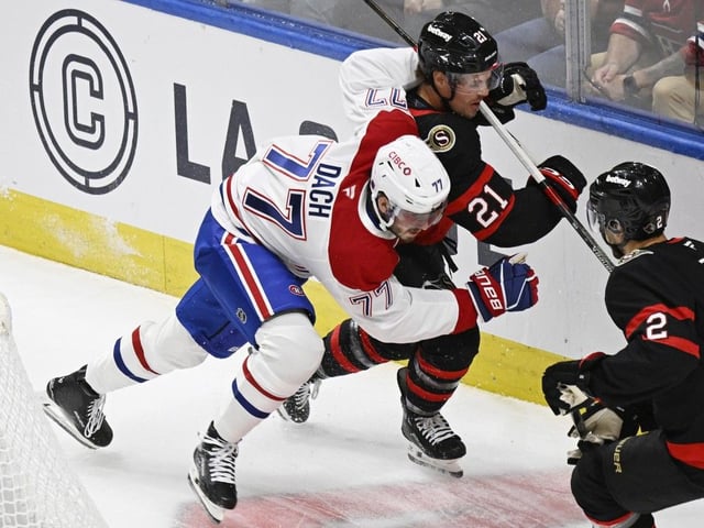 Montreal Canadiens’ Kirby Dach checks Ottawa Senators’ Nick Cousins during NHL preseason action in Quebec City on Tuesday. Jacques Boissinot/The Canadian Press