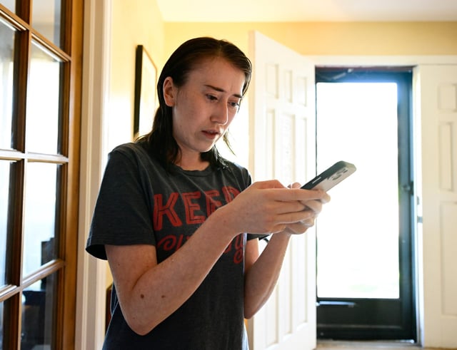 Molly Kirkham orders an Uber from her home in Golden, Colorado, to see friends in Arvada on Thursday, Sept. 25, 2025. (Photo by Andy Cross/The Denver Post)
