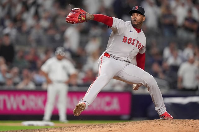 Boston Red Sox pitcher Aroldis Chapman delivers against the New York Yankees during the ninth inning of Game 1 of an American League wild-card baseball playoff series, Tuesday, Sept. 30, 2025, in New York. (AP Photo/Frank Franklin II)