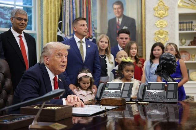 WASHINGTON, DC - SEPTEMBER 30: U.S. President Donald Trump speaks before signing executive orders in the Oval Office at the White House on September 30, 2025 in Washington, DC. According to Trump, the executive order he was signing will accelerate pediatric cancer research, including by harnessing the power of artificial intelligence. (Photo by Win McNamee/Getty Images)