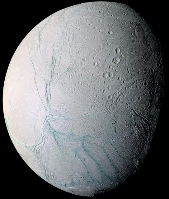 Icy on the outside but liquid below? A vast ocean is churning below the hard shell of  Enceladus
