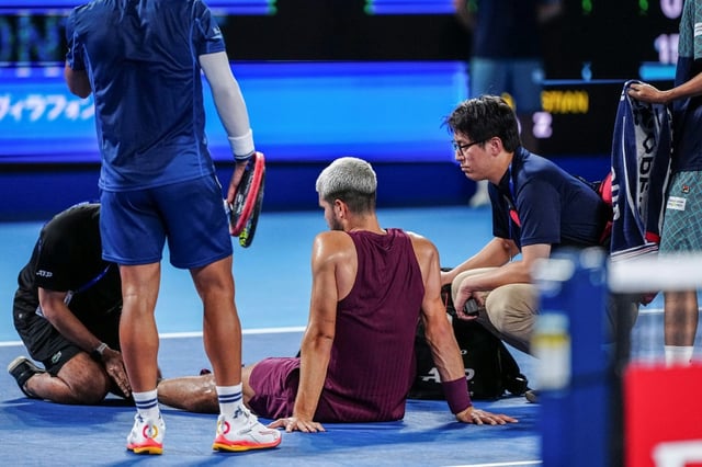 Carlos Alcaraz gets medical attention in Tokyo
