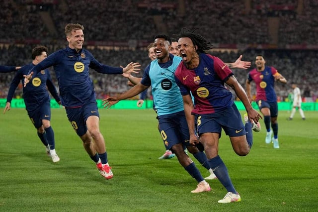 Jules Kounde celebrates the winner for Barcelona in the Copa del Rey final