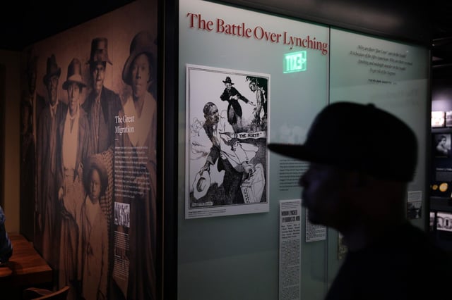 A visitor browses an exhibition about "The Battle Over Lynching" in the United States at the Smithsonian National Museum of African American History and Culture on Aug. 28, 2025, in Washington. The Trump administration will review the exhibition contents of 18 Smithsonian museums to reflect “unity, progress, and enduring values that define the American story” ahead of the nation’s 250th anniversary celebrations. (Alex Wong/Getty)