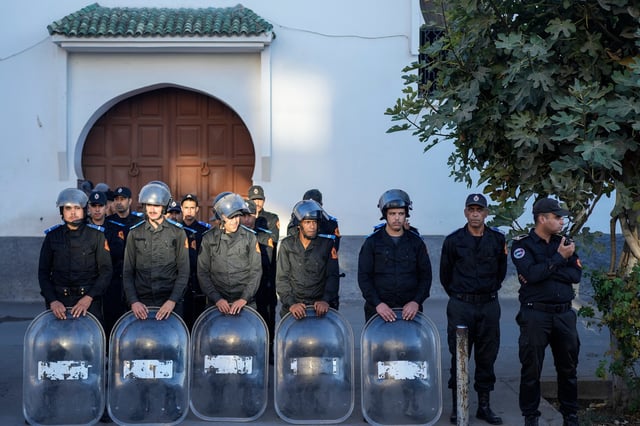 Security forces stand guard as they anticipate a youth led protest calling for education and health reforms, in Casablanca, Morocco, Monday, Sept. 29, 2025. (AP Photo/Mosa'ab Elshamy)