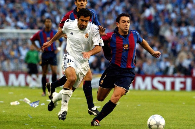Luis Figo playing for Real Madrid against Barcelona