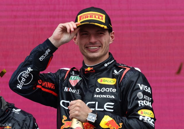 Formula One F1 - Azerbaijan Grand Prix - Baku City Circuit, Baku, Azerbaijan - September 21, 2025 Red Bull's Max Verstappen celebrates on the podium after winning the Azerbaijan Grand Prix REUTERS/Leonhard Foeger/File Photo