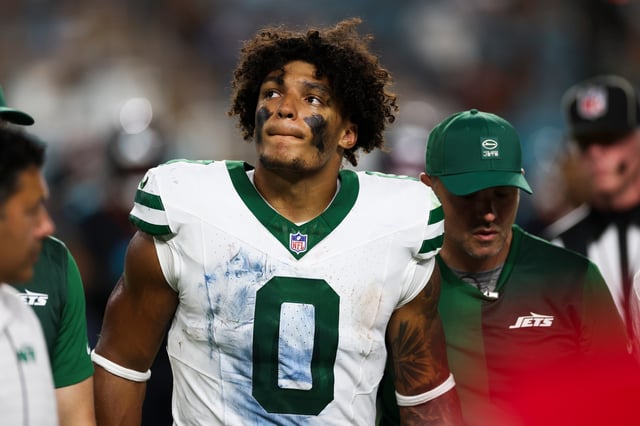 MIAMI GARDENS, FLORIDA - SEPTEMBER 29: Braelon Allen #0 of the New York Jets stands on the field after being injured in the second quarter of a NFL football game against the Miami Dolphins at Hard Rock Stadium on September 29, 2025 in Miami Gardens, Florida. (Photo by Logan Bowles/Getty Images)