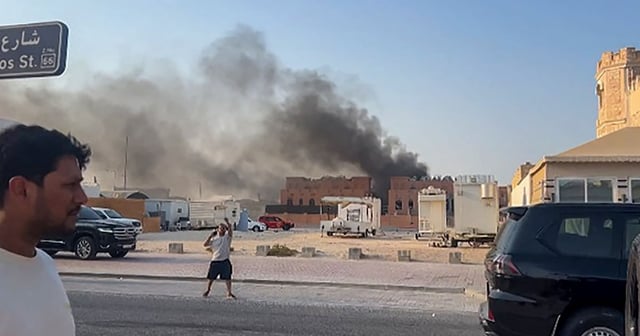 Smoke billows after explosions in Doha's capital Qatar on September 9, 2025. AFP