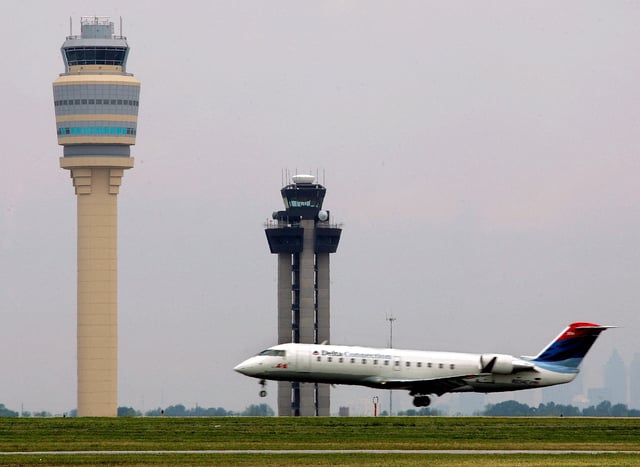 A Delta Air Lines aircraft lands at Hartsfield-Jackson Atlanta International Airport in Atlanta, Georgia May 16, 2006. REUTERS/Tami Chappell/File Photo